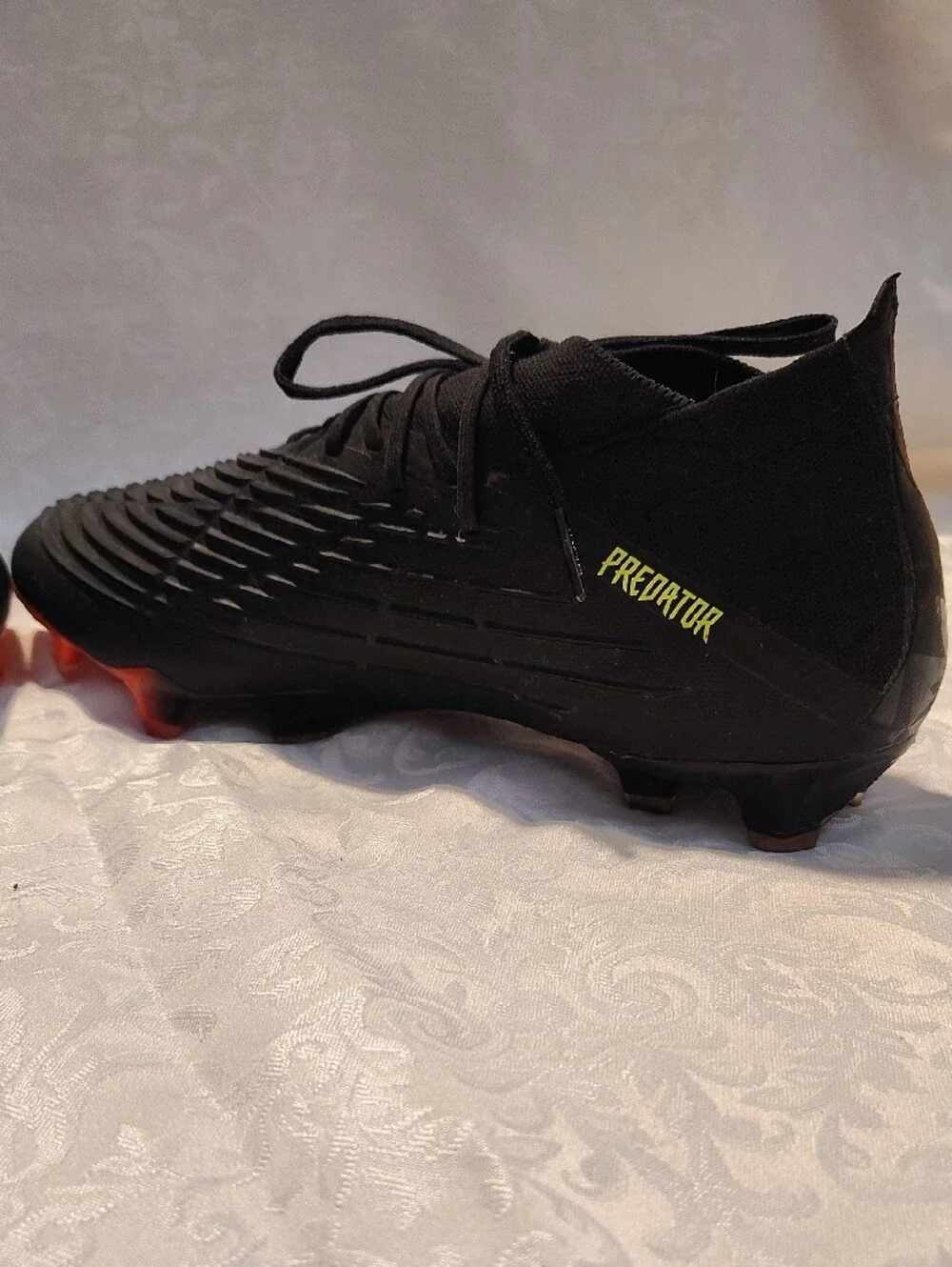 Adidas Men’s Black Soccer Cleats with Neon Yellow Stripes
